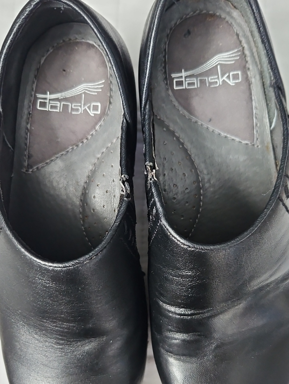 Dansko Black Leather Women's Slip-On Loafers